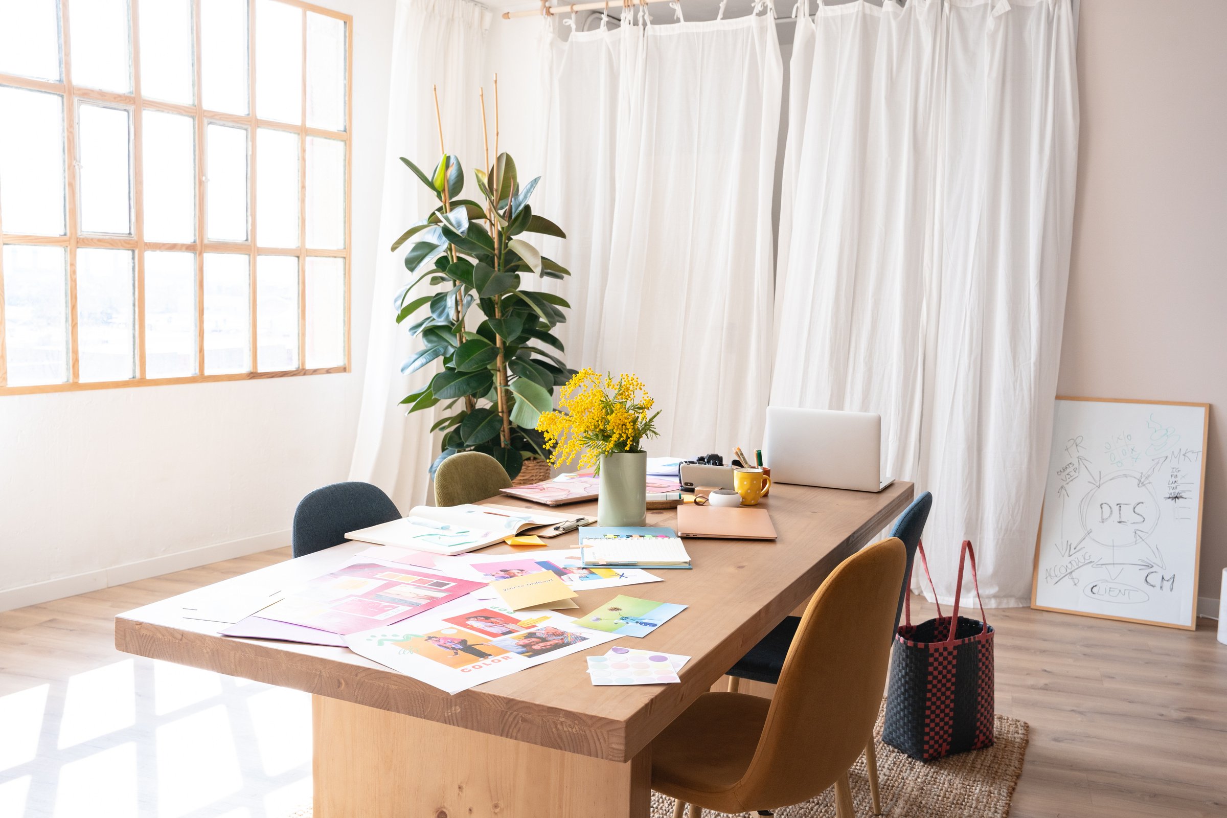 Collaborative Creative Team Branding Materials on Table