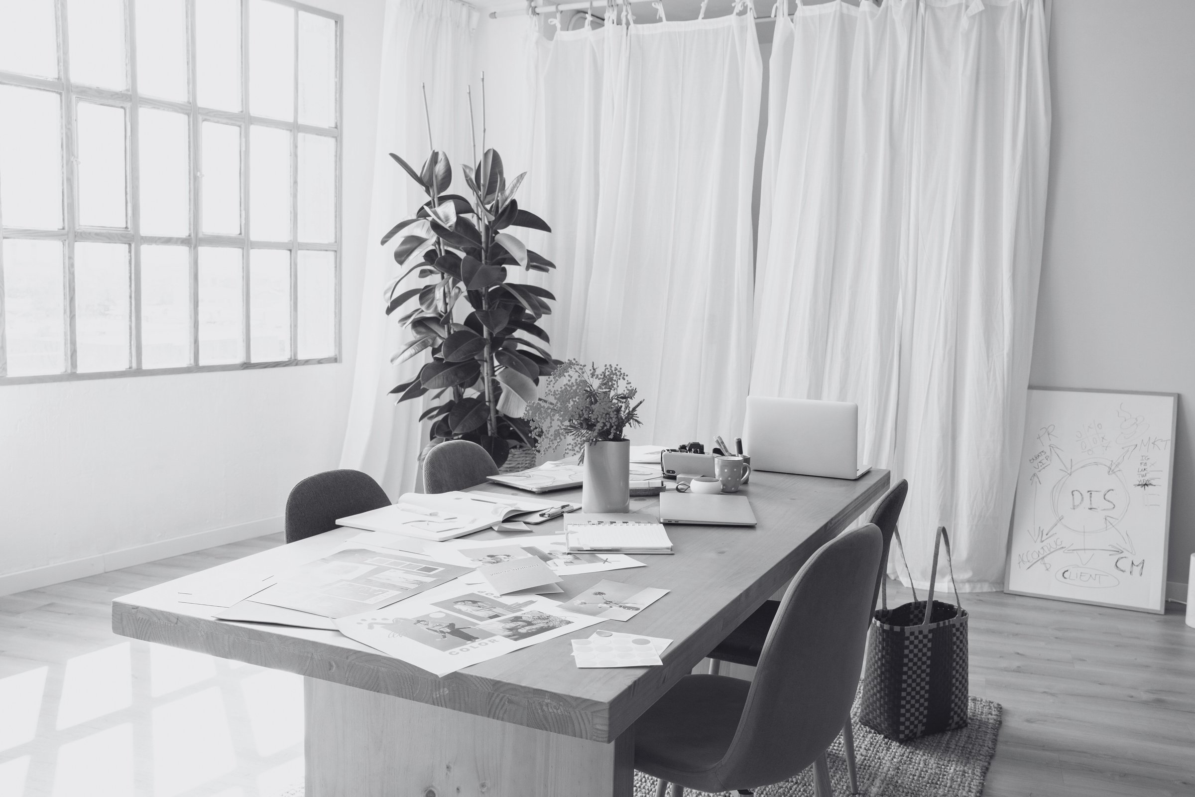 Collaborative Creative Team Branding Materials on Table